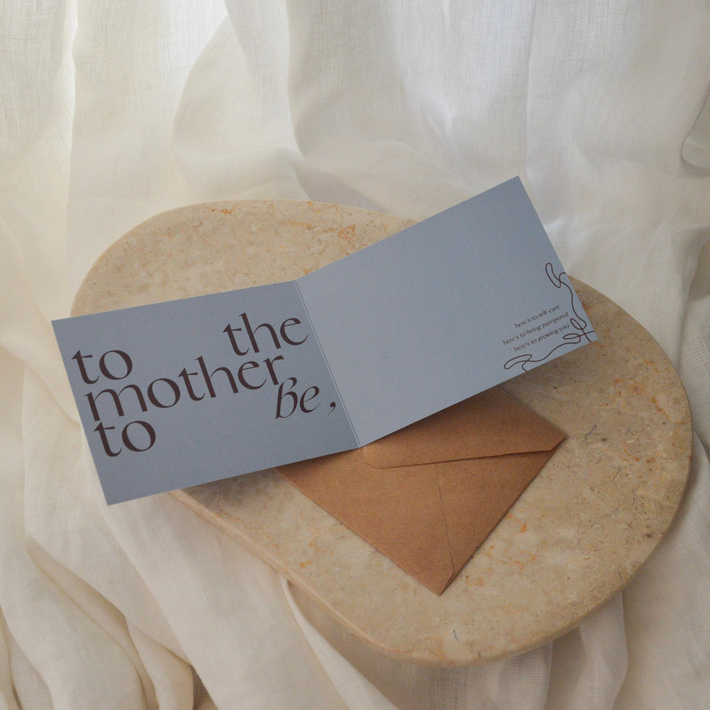 Personalized card with 'to the mother be' text 