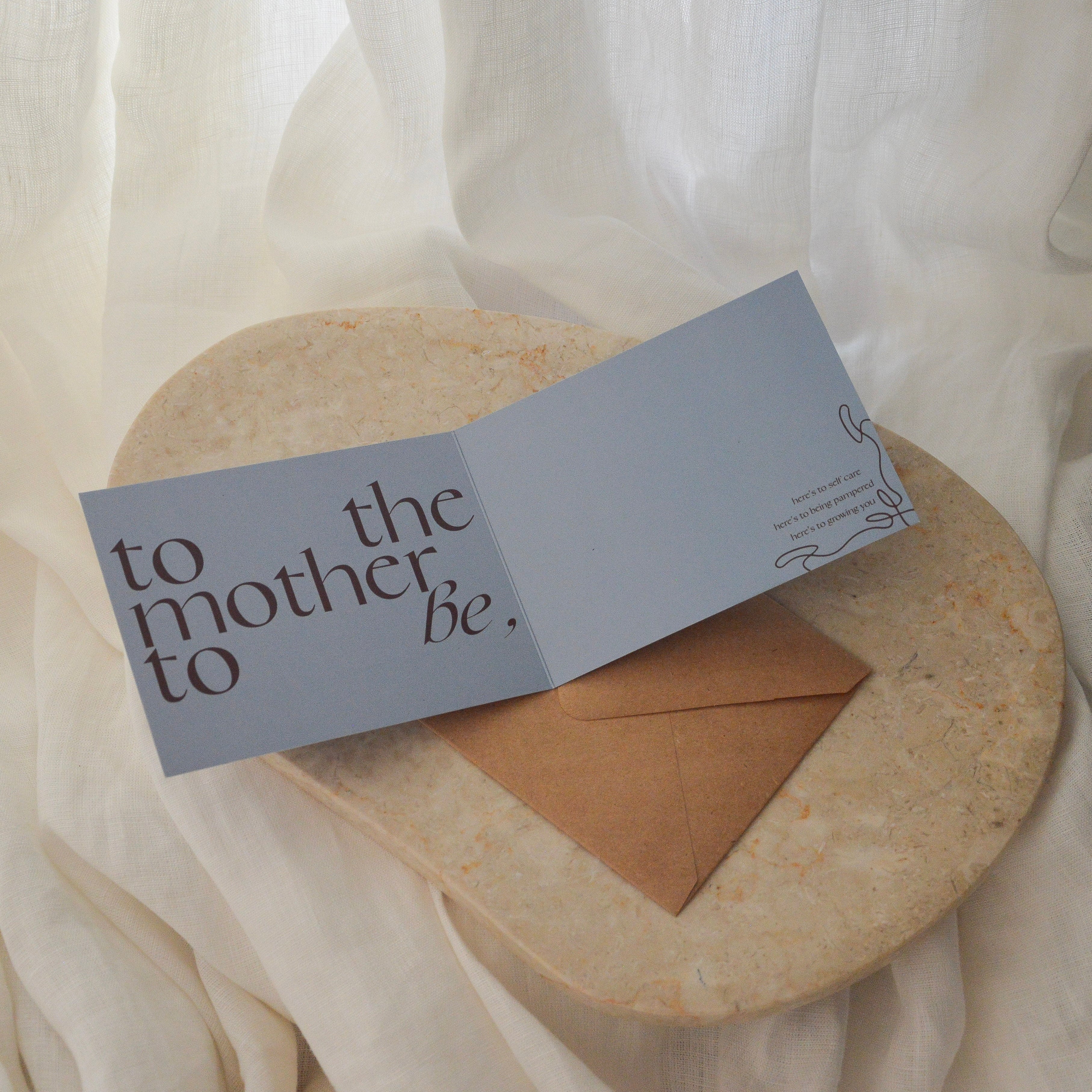 Personalized card with 'to the mother be' text 